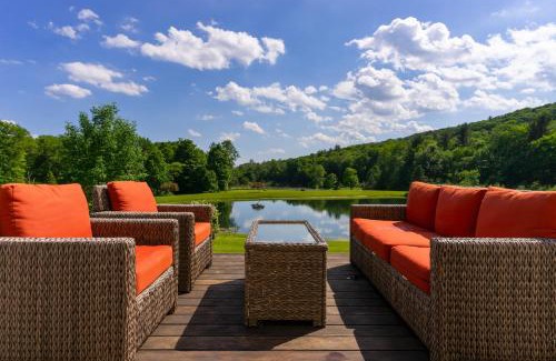 Austerlitz House | Secluded Berkshires Estate Private PondPoolTheater Gym Sunny Pond