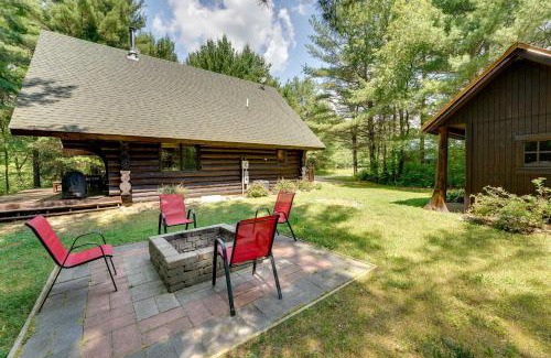 Paris House | Secluded Log Cabin in NW Michigan Hot Tub and Deck