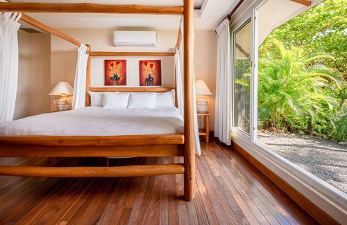 Islita Villa | Serene home in lush setting with private plunge pool, ocean & mountain view
