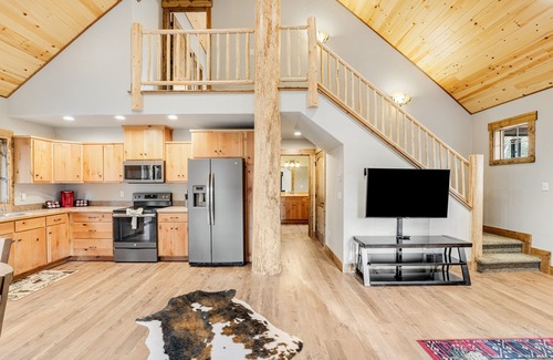 Bigfork Cabin | Serene woodland cabin with firepit, porches & fireplace, near lakes & Glacier