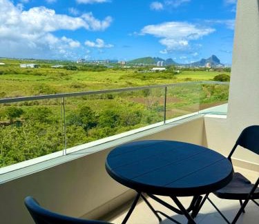 Candos Apartment | Serenity Sunset View Apartment Hotel - Verdant Garden