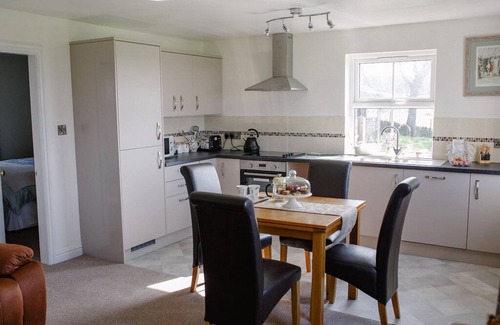 Otley Cottage | Set on a working Dairy farm stunning views, a hot tub and pet freindly