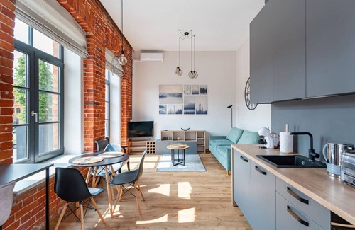 Kaunas Apartment | Shanti barracks apartment 3 by Polo Apartments