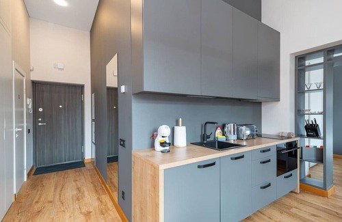 Kaunas Apartment | Shanti barracks apartment 3 by Polo Apartments