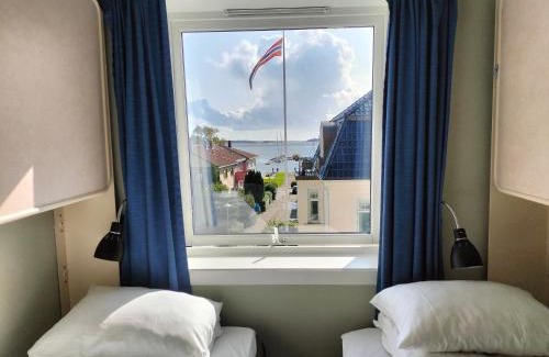 Kristiansand Hotel | Sjøgløtt Gjestgiveri