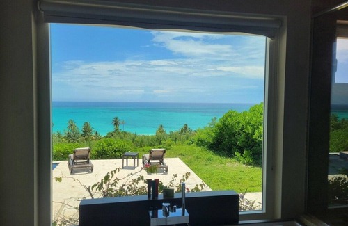 Governor's Harbour House | Sky Beach Club Villa Waterfall 2 4 Bedroom Home