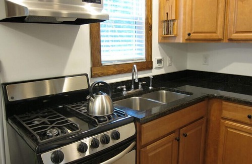Clarksville Cottage | Solar powered cottage at lake, with dock, on private 300 acre timber preserve