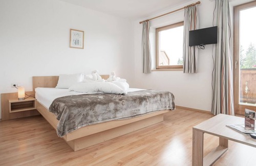 Scheffau am Wilden Kaiser Bed & Breakfast | Sonnenstrahl 5 guests, from 4N, half board - Berggasthof Bärnstatt