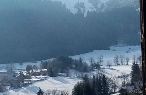 Gresse-en-Vercors Apartment | South-facing apartment overlooking the mountains. Nearby swimming pool and ski slopes