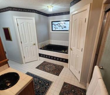 Olive Branch House | Southern Large Lake Front Custom Estate, Sleeps 16