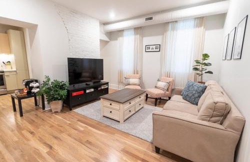 Central Business District Apartment | Spacious 2 bed 2 bath Downtown OTR condo minutes walk to the Reds Bengals stadium & more!