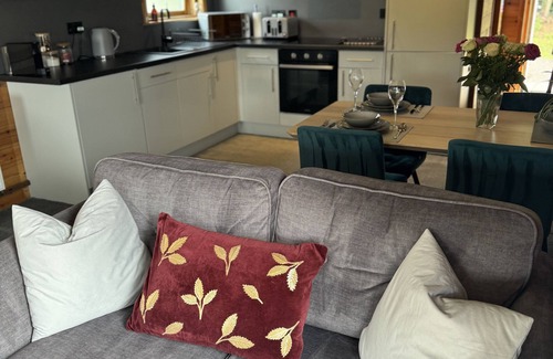 Pitlochry Cabin | Spacious Lodge with woodburner, hot tub and beautiful views from the patio deck.