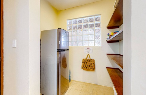 Majahual House | Spanish-style home with pool, W/D, 2 living areas & 2 kitchenettes - near beach