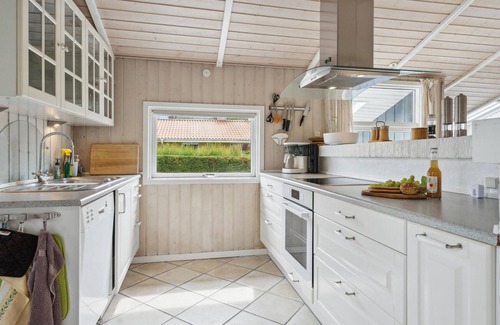 Pøt Strandby House | Spend a relaxing vacation in this beautiful cottage near the beach.