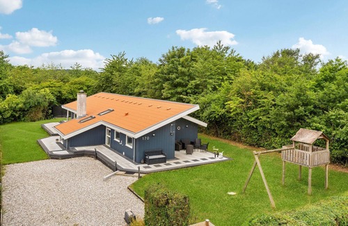 Pøt Strandby House | Spend a relaxing vacation in this beautiful cottage near the beach.