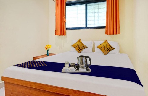 Wadgaon Hotel | SPOT ON New Sangam Lodging & Boarding