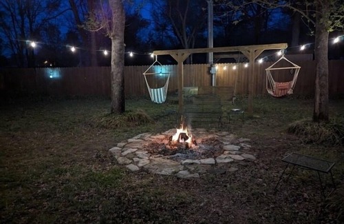 Mammoth Spring Cabin | Spring River Cabin at Saddler Falls with large yard, firepit and swing!