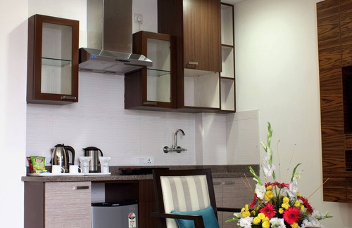 Sushant Lok Hotel | Stately Suites MG Road