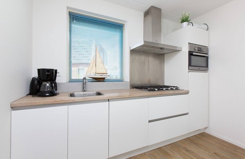 Akkrum House | Stay in our spacious Sneekermeer 4 home with private jetty.