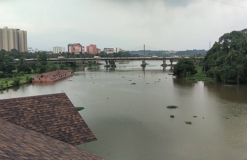 Kakkanad House | Stay In the city. But in a village ambience. Over looking the forest