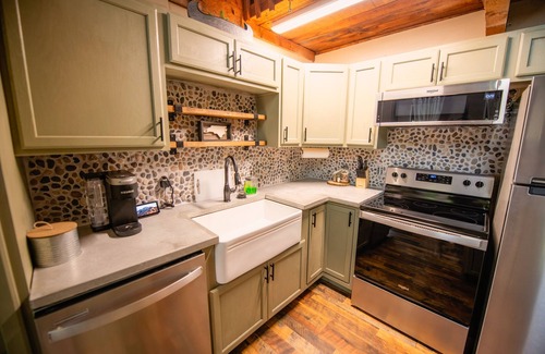 Cherokee Cabin | Stay in the Treehouse Lodge! Hot tub, game room, fire place, wrap around porch!