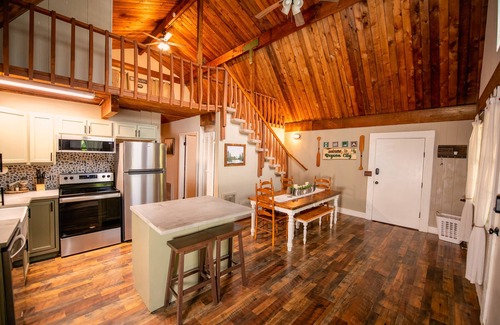 Cherokee Cabin | Stay in the Treehouse Lodge! Hot tub, game room, fire place, wrap around porch!