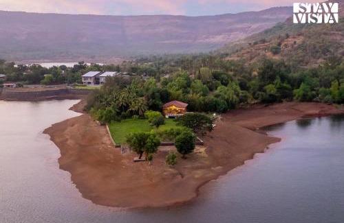 Wadgaon Villa | StayVista at Three Shores with Lake View & Alfresco Dining
