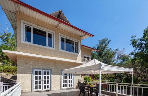 Nandanwan Villa | StayVista's Chimney Cottage with Sprawling Lawns, Picturesque Views, Plunge Pool, Jacuzzi, and Home Theatre