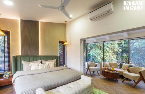 Parshwapuram Villa | StayVista's House Of J - Embrace Leisure with Lawn, Pool, and Gazebo