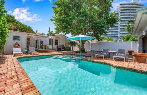 Lauderdale Beach House | Steps from Beach Quaint Cottage Heated Pool Sand Key RESlDENCES
