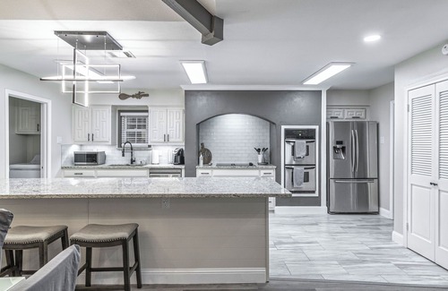 Rowlett House | Steps From The Lake with 5 Bedrooms & 4 Baths, Heated Pool and Hot Tub!