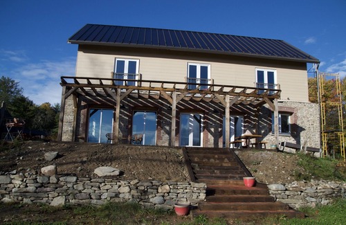 Sparrow Bush House | Stone Eco House on 120 acres with a pond, meadows, brook, and hiking trails.