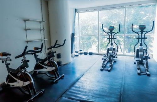 Siwalankerto Apartment | Strategic Studio Apartment at High Point Serviced By Travelio