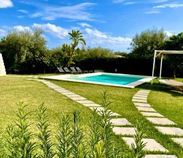 Avola House | Strelitzia's house with heated pool , private garden and private parking & wi-fi