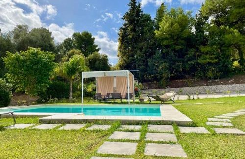Avola House | Strelitzia's house with heated pool , private garden and private parking & wi-fi