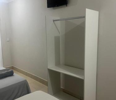 Santa Monica Apartment | Studio 38 - Studio aconchegante na melhor localização próx a Parque do sabiá, Estádio, Shopping e Aeroporto