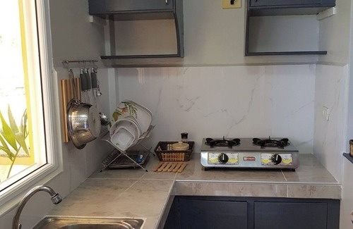 Puerto Galera Apartment | Studio apartment with pool and ocean views .