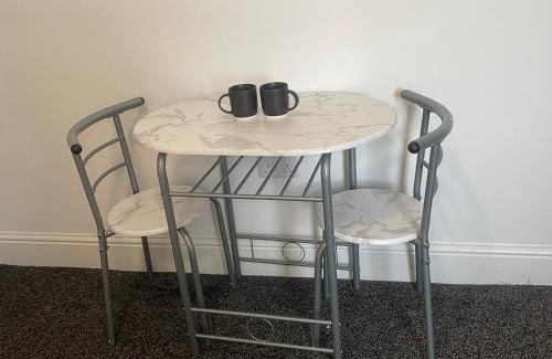 Colne Apartment | studio apartment with small kitchen and bathroom