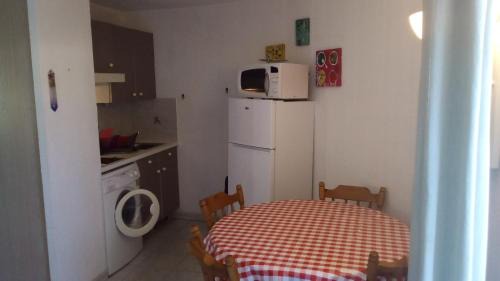 Cavaliere Apartment | Studio de 27 m² + 70 m² de jardin à 100 m des plages