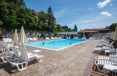 Susello Apartment | Studio with sunny balcony in a residence with pool