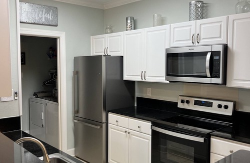 Foley Condo | Stunning 3BR, 2BA luxury retreat with pool view, just 7 miles from the beach!