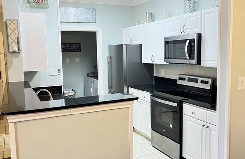 Foley Condo | Stunning 3BR, 2BA luxury retreat with pool view, just 7 miles from the beach!