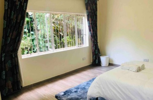 Harare East Apartment | Stunning Private Apartment with a Beautiful Garden Oasis!