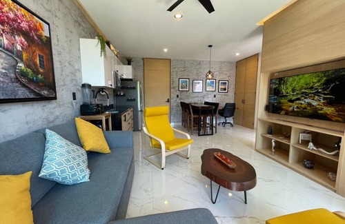 Lazaro Cardenas Condo | Stunning sunset view from the rooftop infinity pool. 5 min walk to the beach.