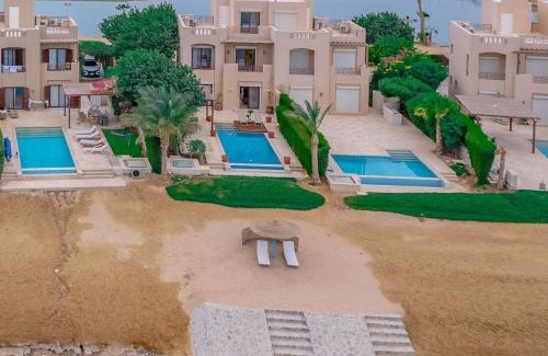 Shurtah al-Dakhlah Villa | Stylish 4-Bedroom Villa with a Pool & Lagoon Access