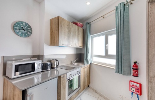 Bugibba Apartment | Stylish Apartment in Bay Square 4