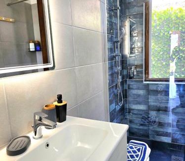 Solanas Apartment | Stylish home with patio 4 min walk to the beach