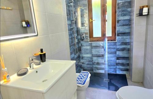 Solanas Apartment | Stylish home with patio 4 min walk to the beach