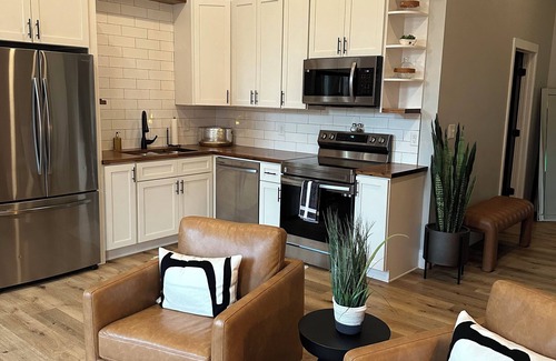 Warsaw Apartment | Stylish & Modern 2-Bdrm Apt in Downtown Warsaw featuring an urban rooftop deck.