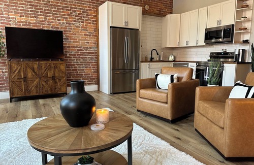 Warsaw Apartment | Stylish & Modern 2-Bdrm Apt in Downtown Warsaw featuring an urban rooftop deck.